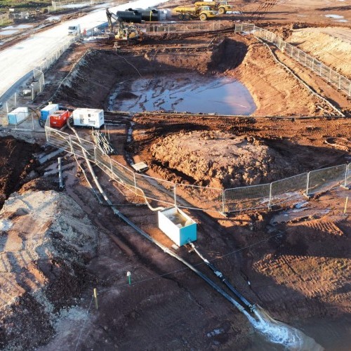 Wellpoint and deepwell dewatering systems required to enable excavations in fractured MUDSTONE near Newark